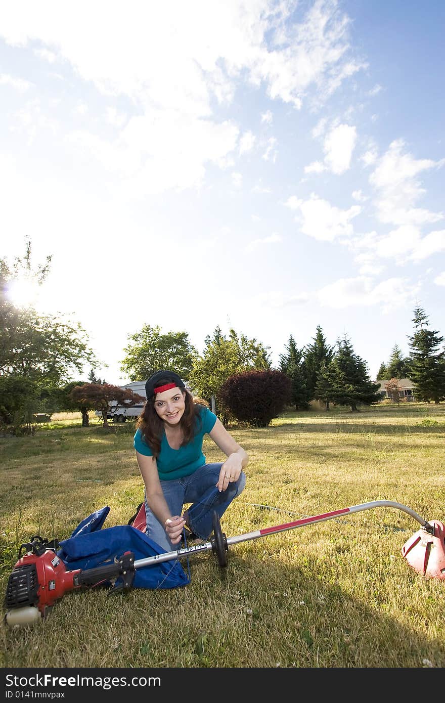 Woman with Weedwacker