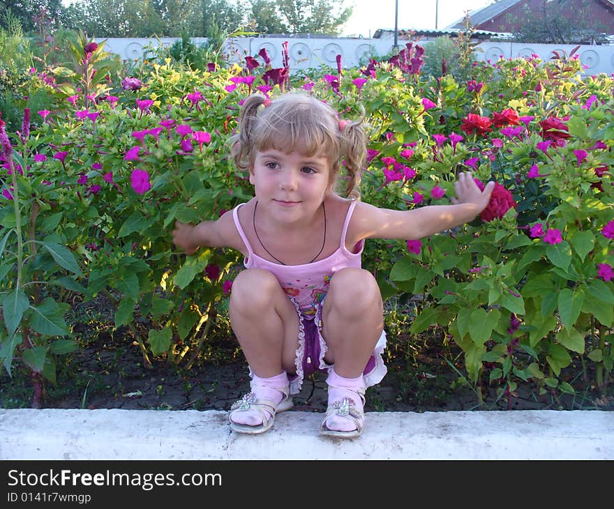 Child In Flowers