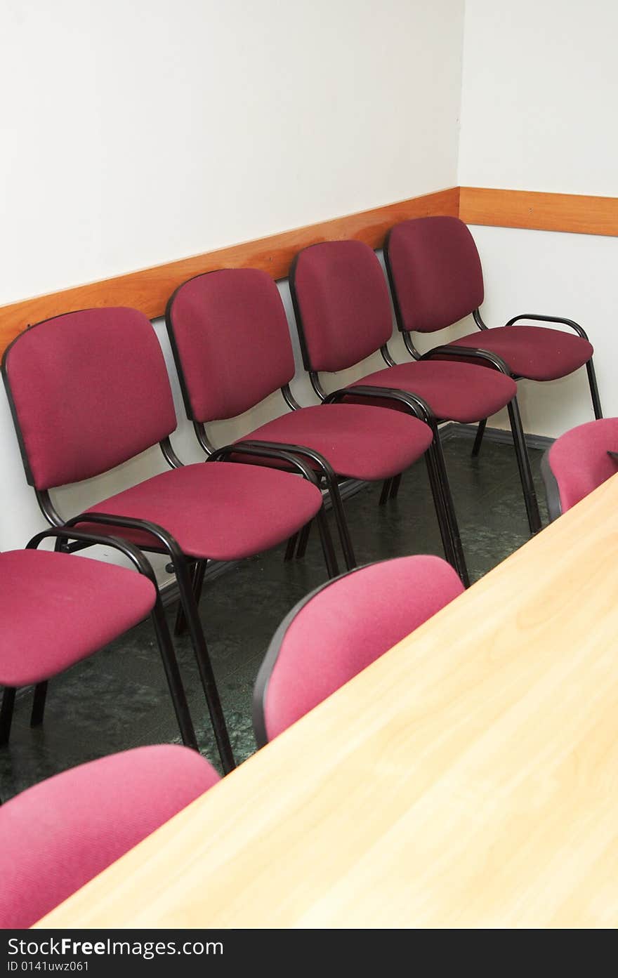 Classroom interior with many red chairs and table. Classroom interior with many red chairs and table