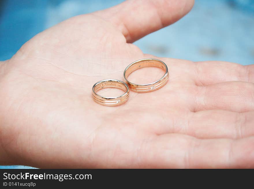 Wedding rings on the groom hand