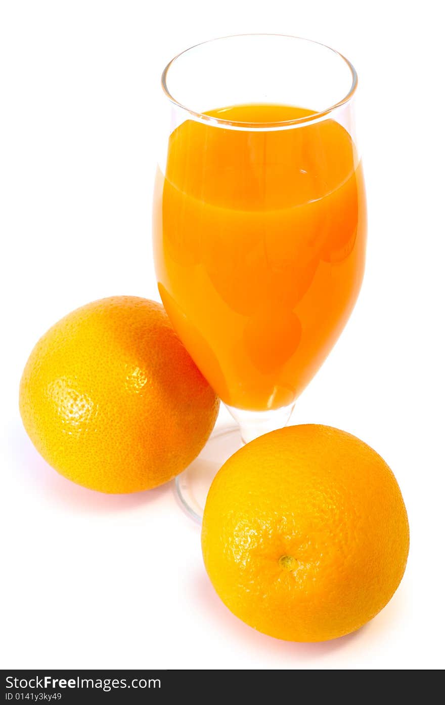 Orange juice in glass and oranges on isolated background. Orange juice in glass and oranges on isolated background.