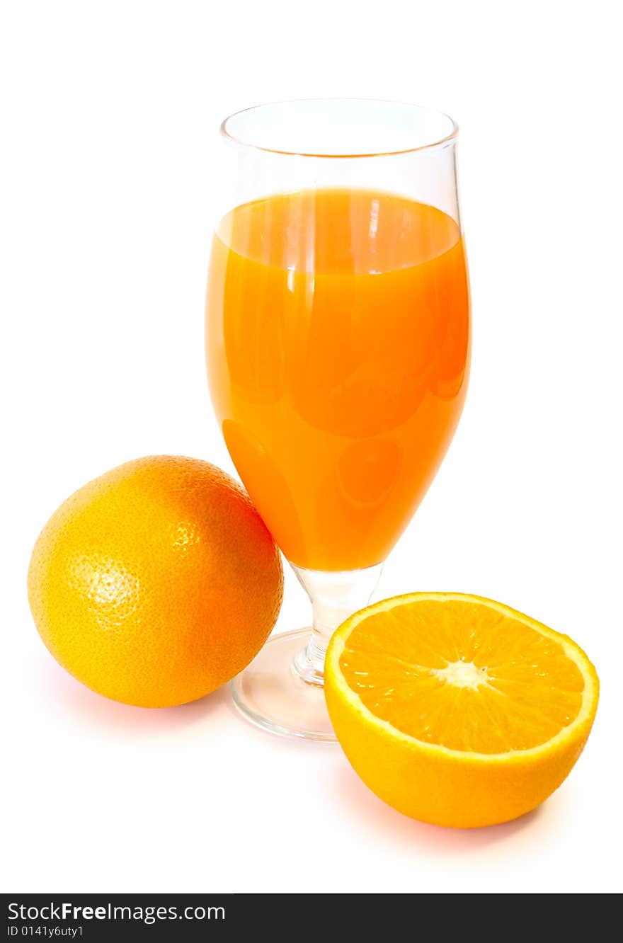 Orange juice in glass and oranges on isolated background. Orange juice in glass and oranges on isolated background.