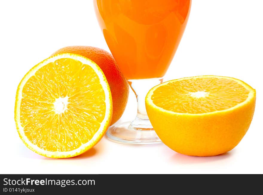 Orange juice in glass and oranges on isolated background. Orange juice in glass and oranges on isolated background.