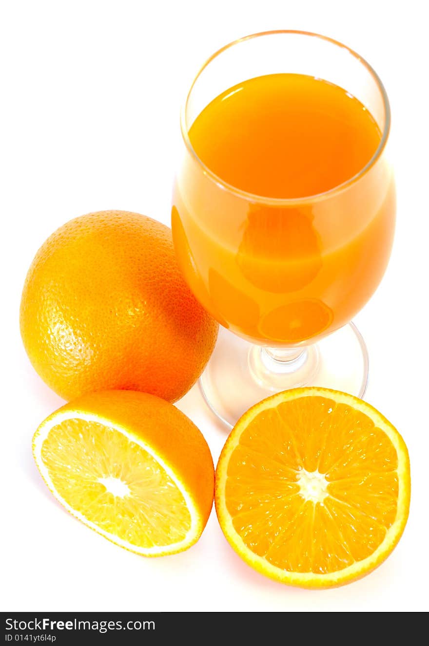 Orange juice in glass and oranges on isolated background. Orange juice in glass and oranges on isolated background.