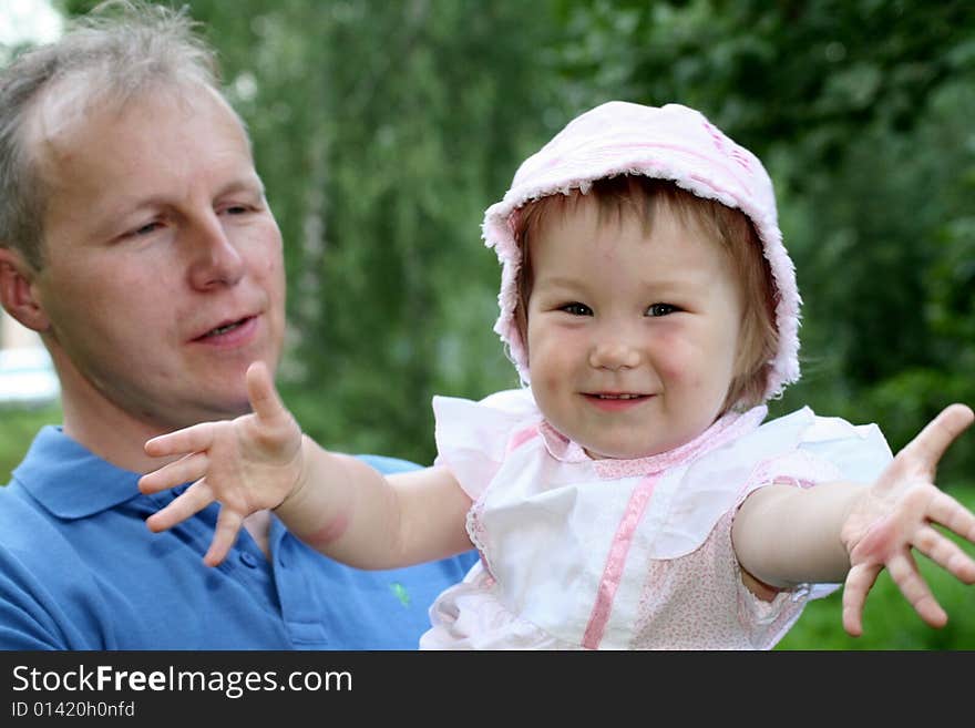 Little girl on her father's hands. Little girl on her father's hands