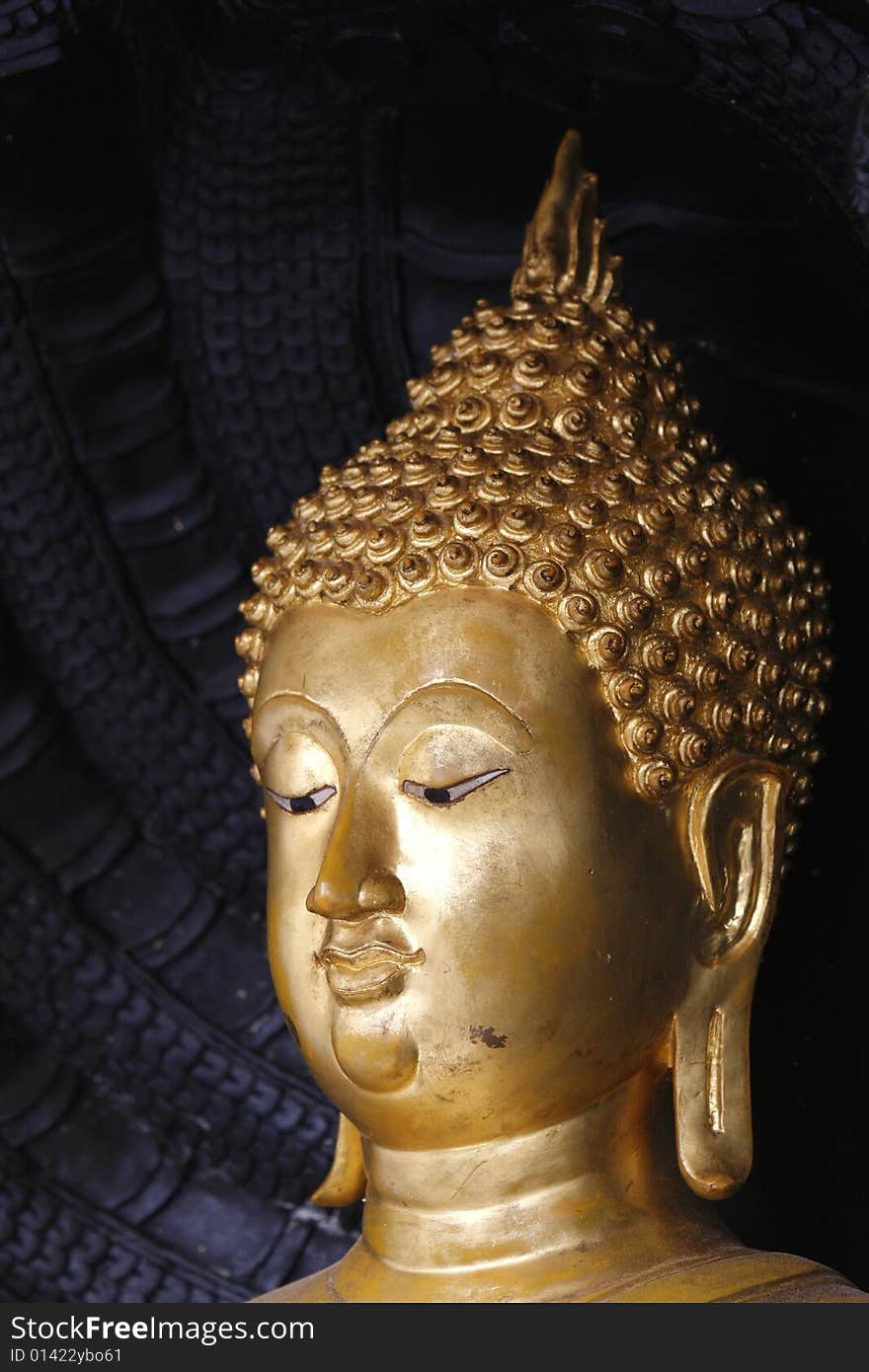 A buddha image in a historical park in inland Thailand. A buddha image in a historical park in inland Thailand