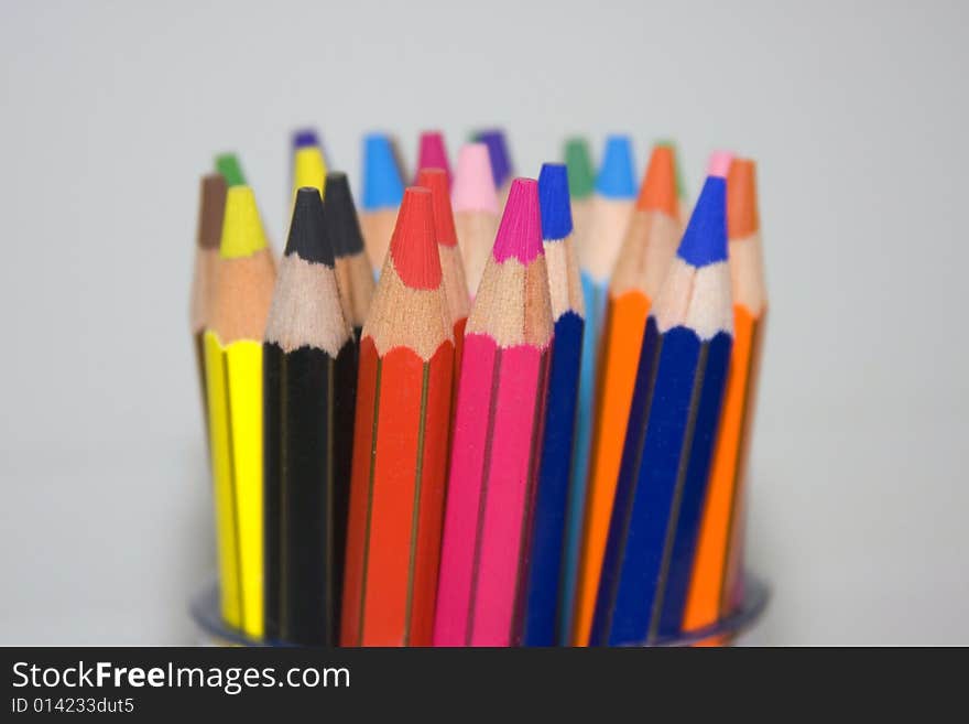 Color pencils in a pencil pot. Color pencils in a pencil pot.