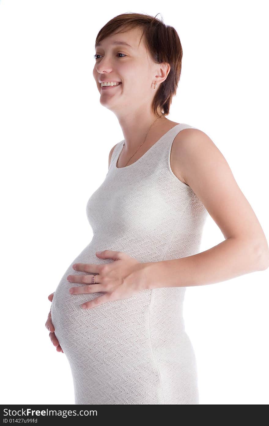 Caucasian woman who is 9 months pregnant on white background. Caucasian woman who is 9 months pregnant on white background