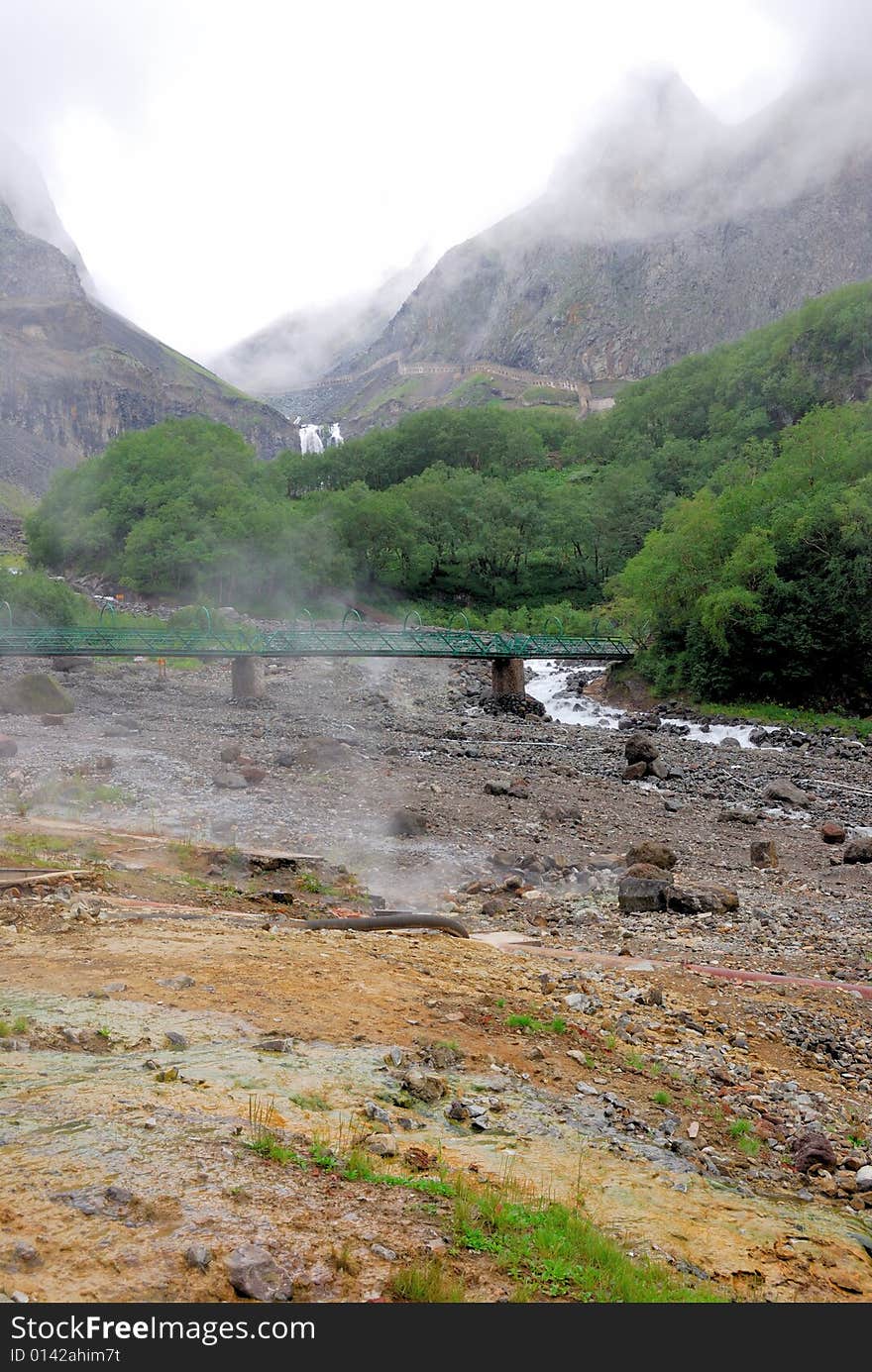 The hot spring near Changbai Waterfall in Changbaishan (Changbai Mountains or Baekdu) in Jilin Province, China. The hot spring near Changbai Waterfall in Changbaishan (Changbai Mountains or Baekdu) in Jilin Province, China.