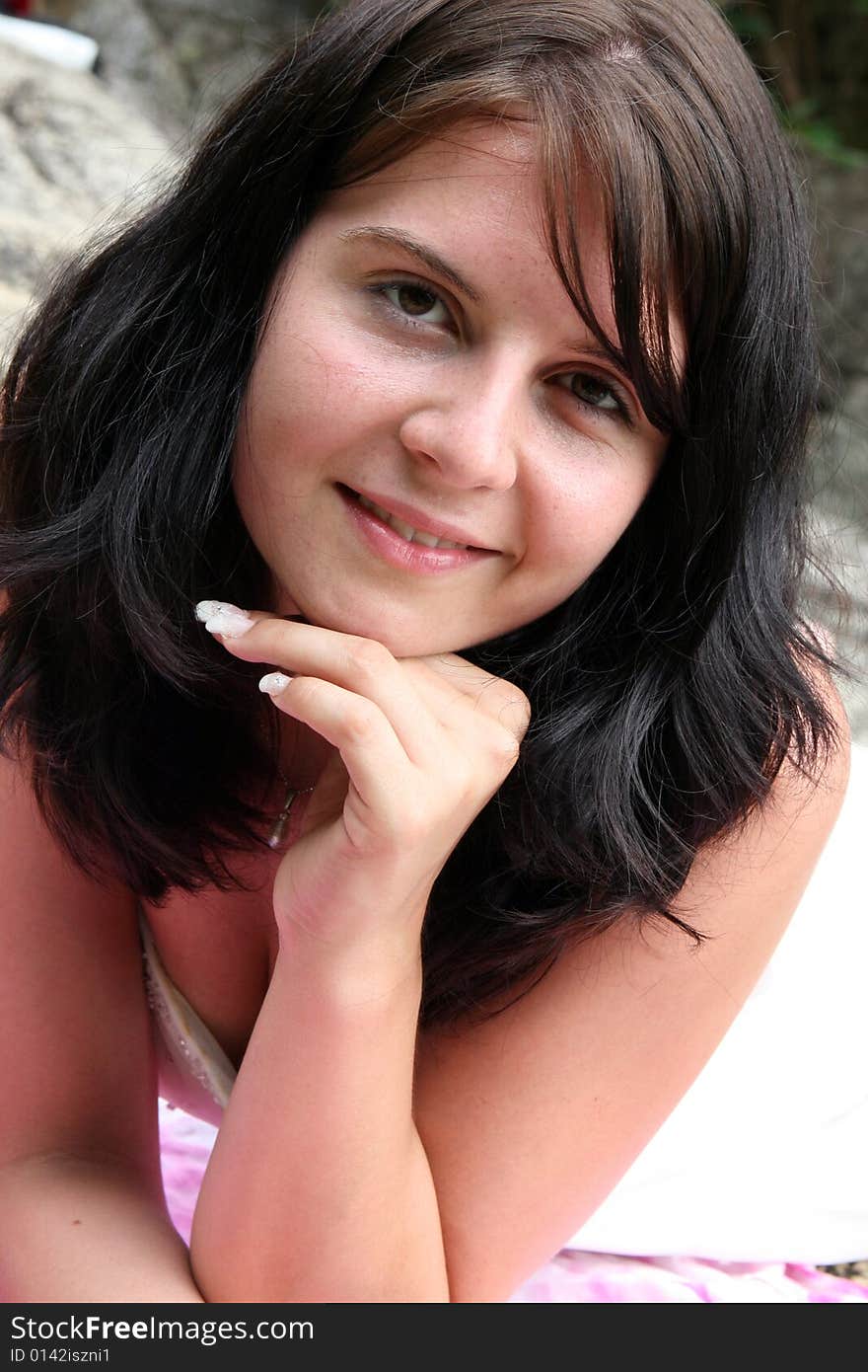 Portrait of a happy brunette woman.