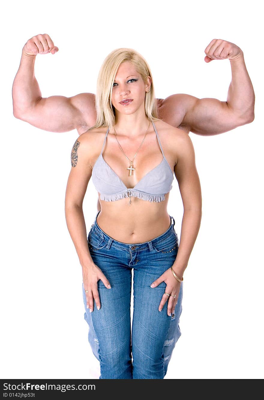 Young couple posing in jeans isolated on white