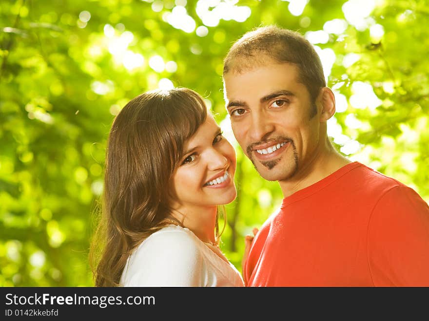 Young couple in love outdoors. Close-up portrait