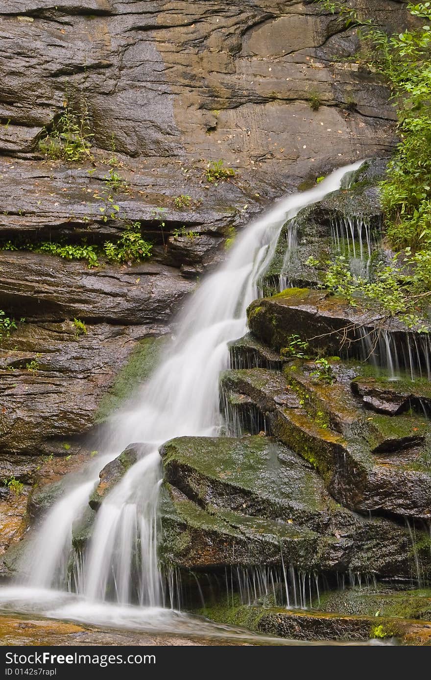 Waterfall In  Mountains