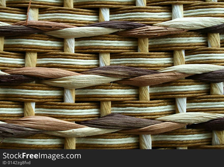 background braided from wooden wickers closeup