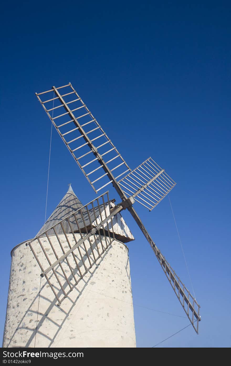 An old windmill on a sunny day in southern france