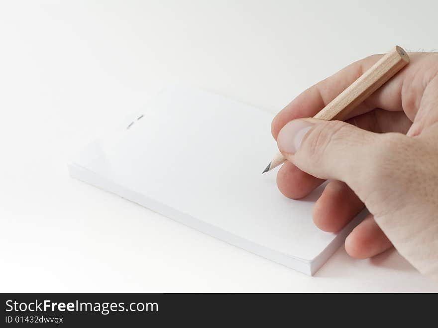 Hand writing on a blank paper