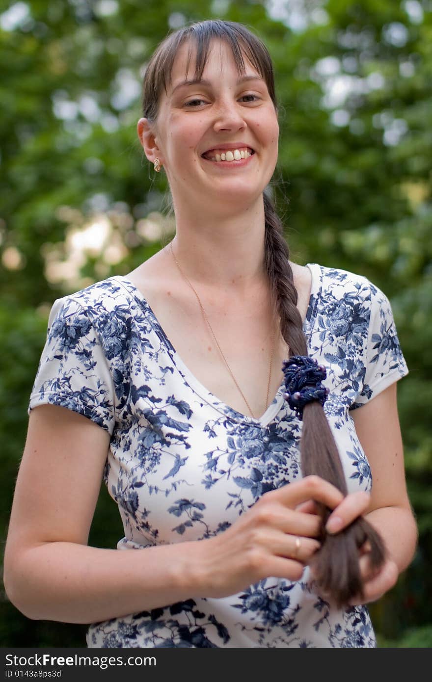 Smiling girl on green background