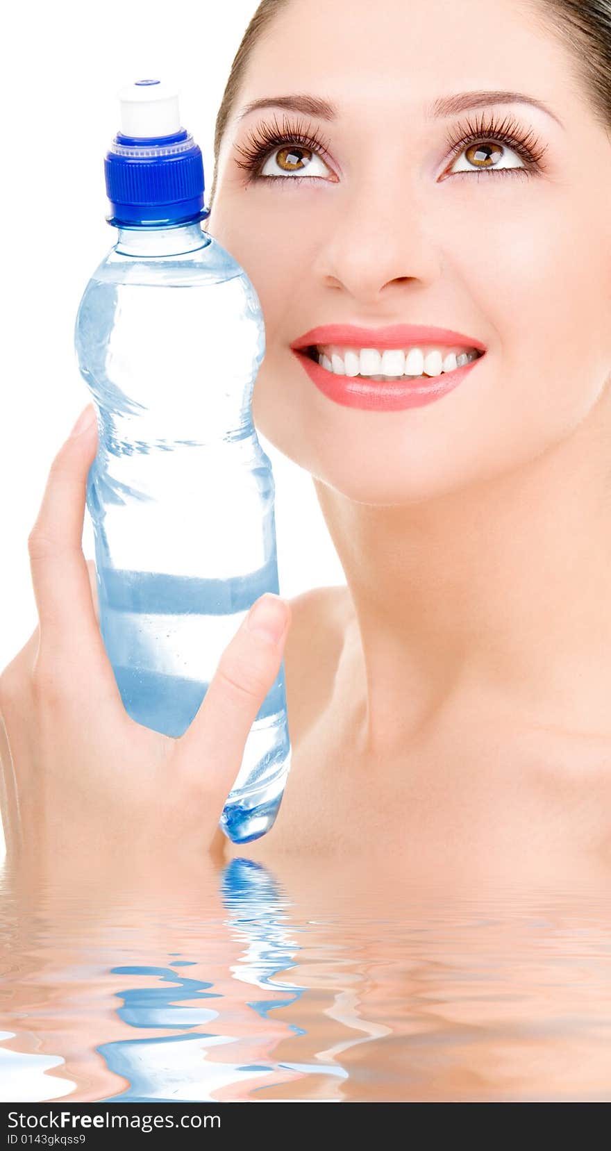 Pretty woman with bottle of water