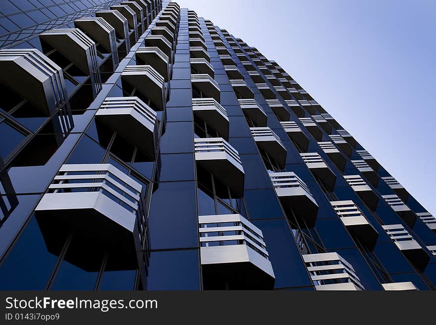 A blue cristal and iron made building. A blue cristal and iron made building