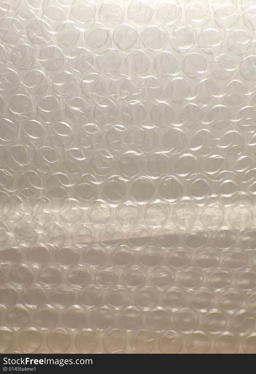 Background made of plastic bubble wrap sheets. Background made of plastic bubble wrap sheets