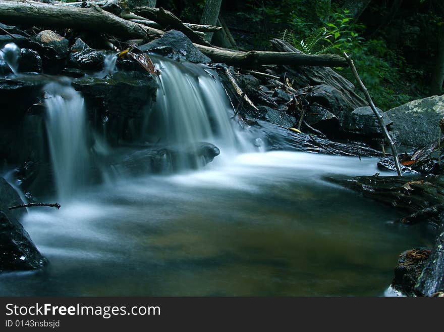 Small water fall in creek. Small water fall in creek