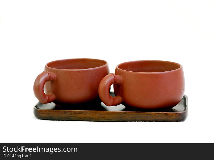 Couple tea cup put on wooden plate. Couple tea cup put on wooden plate