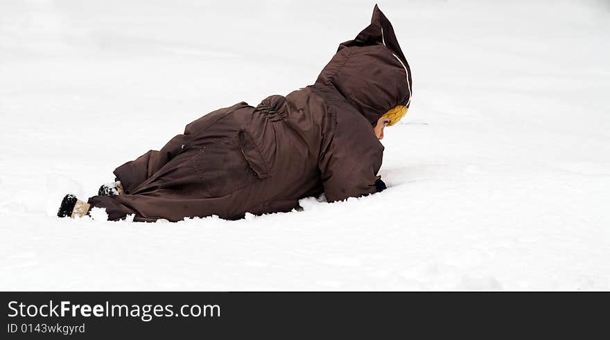 Baby crawling in snow