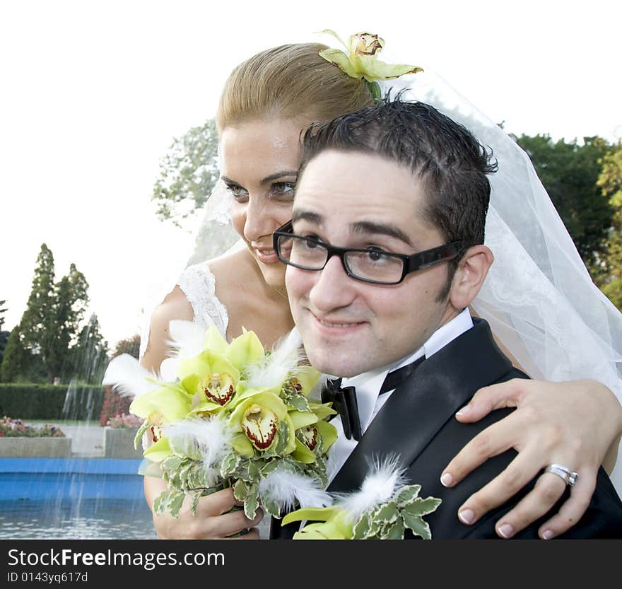 Happy, just married couple kissing in nature. Wedding and marriage concept. Happy, just married couple kissing in nature. Wedding and marriage concept