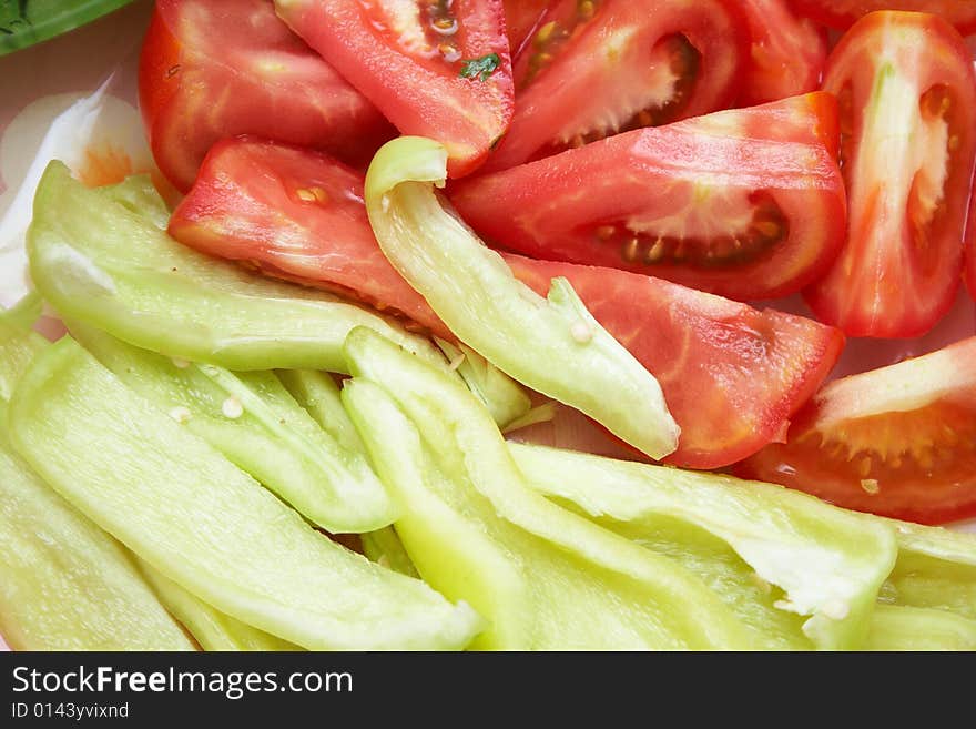 Green pepper and tomato background