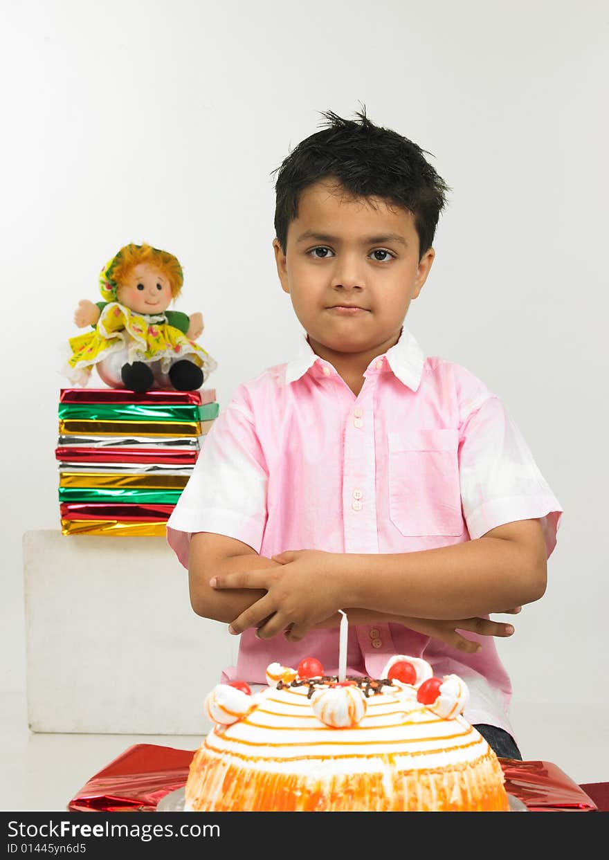 Boy wearing pink shirt celebrating birthday party. Boy wearing pink shirt celebrating birthday party