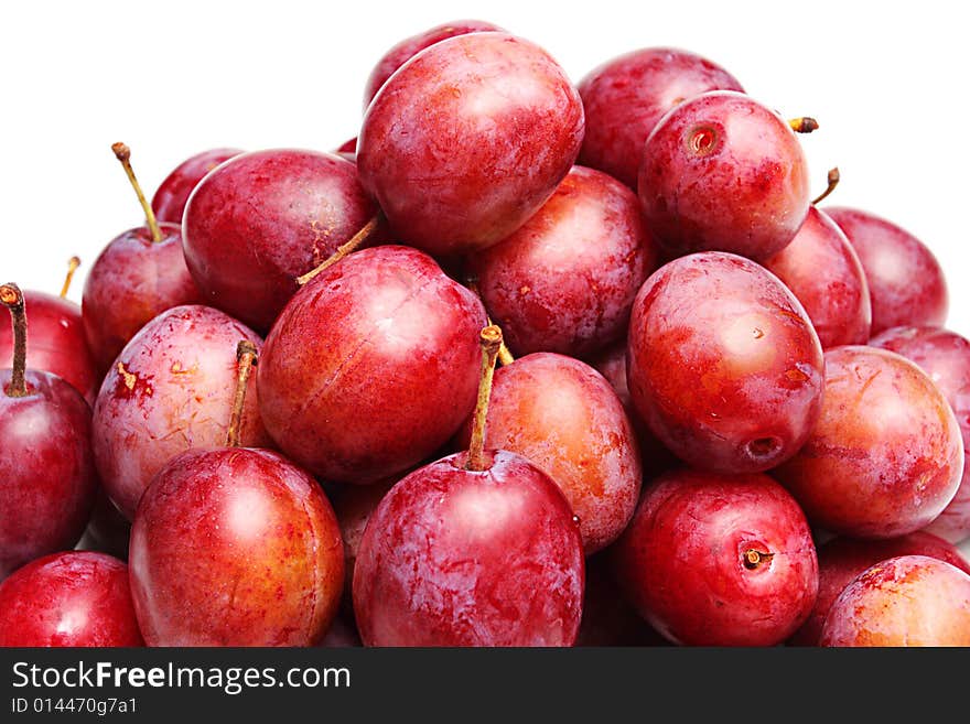 Plums on a white background