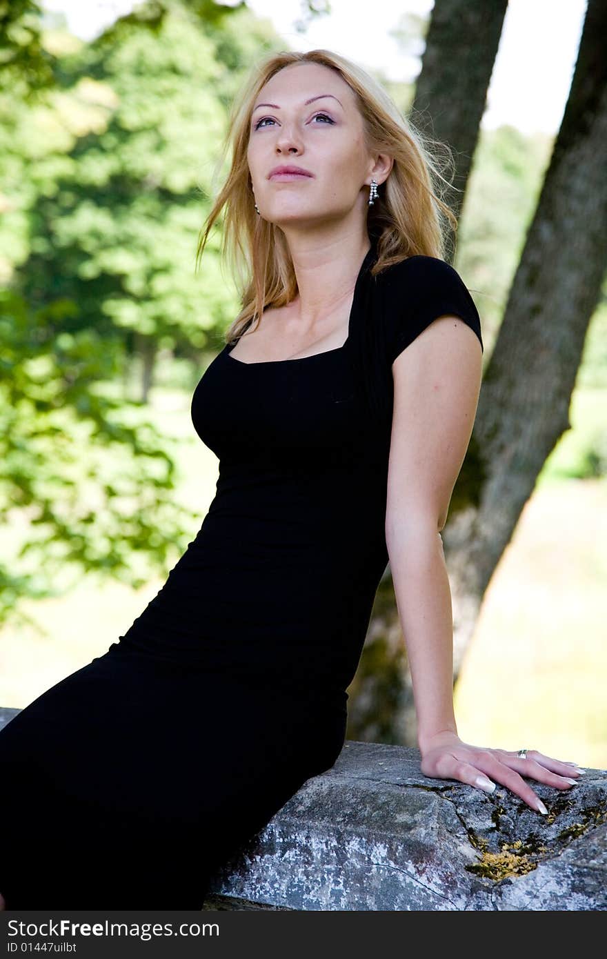 Portrait of young girl on forest background