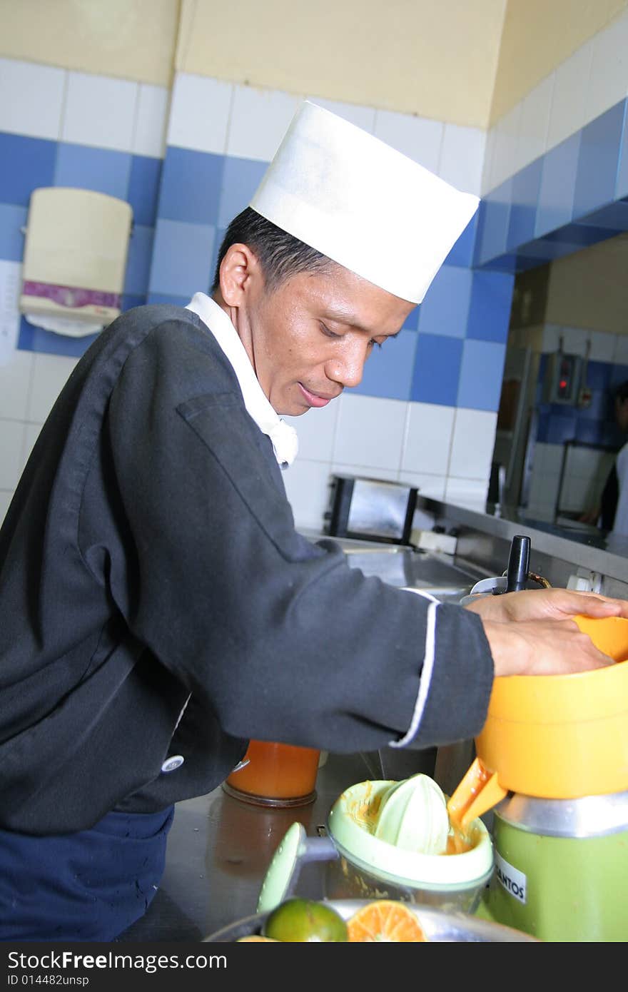 Chef making juice at cold kitchen