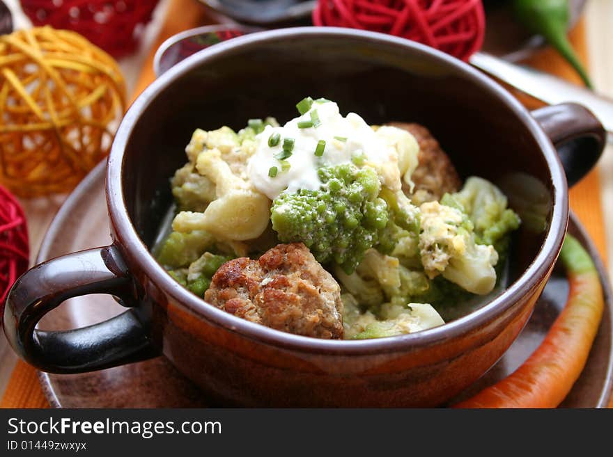 A stew of romanesque and meatballs