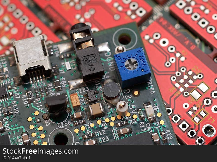 Green circuit board with components. Green circuit board with components.