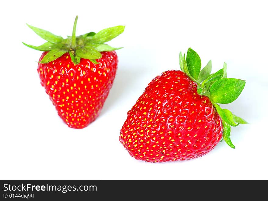 The strawberry isolated over white