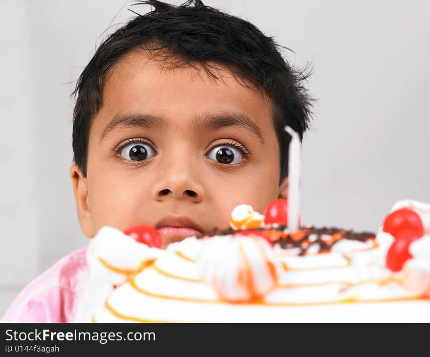 Asian Boy With Birthday Cake