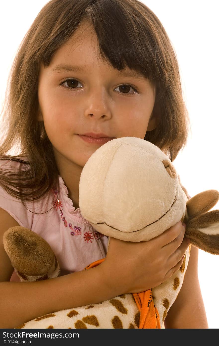 Little girl with plush giraffe on white. Little girl with plush giraffe on white