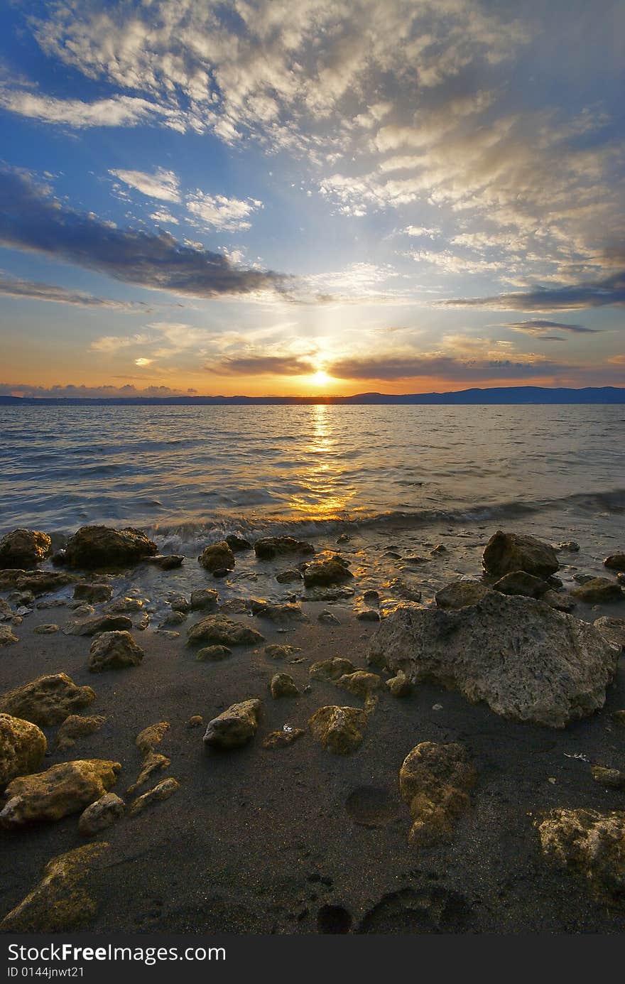 A landscape of sunset on Braccian's Lake near Rome. A landscape of sunset on Braccian's Lake near Rome.