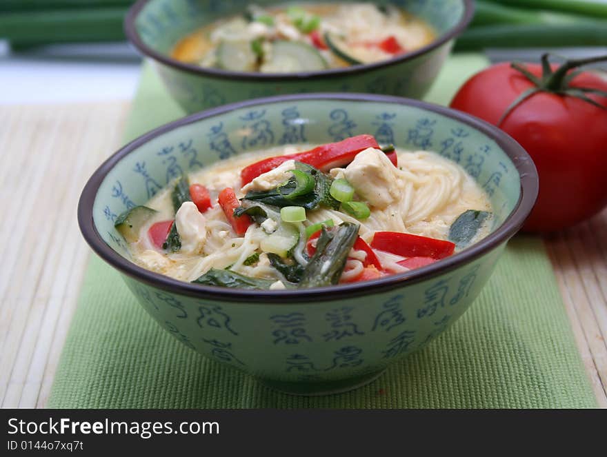 A meal of japanese soup with noodles and vegetables. A meal of japanese soup with noodles and vegetables