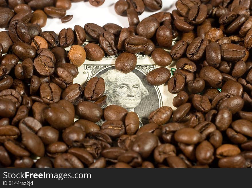 Dollars and coffee beans