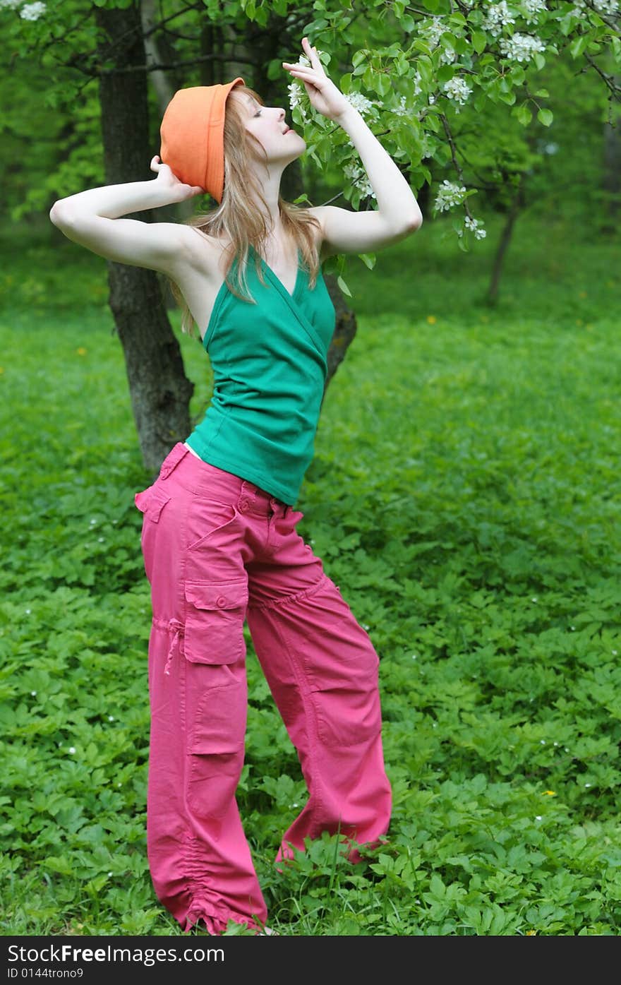 Happy Young Girl In The Park