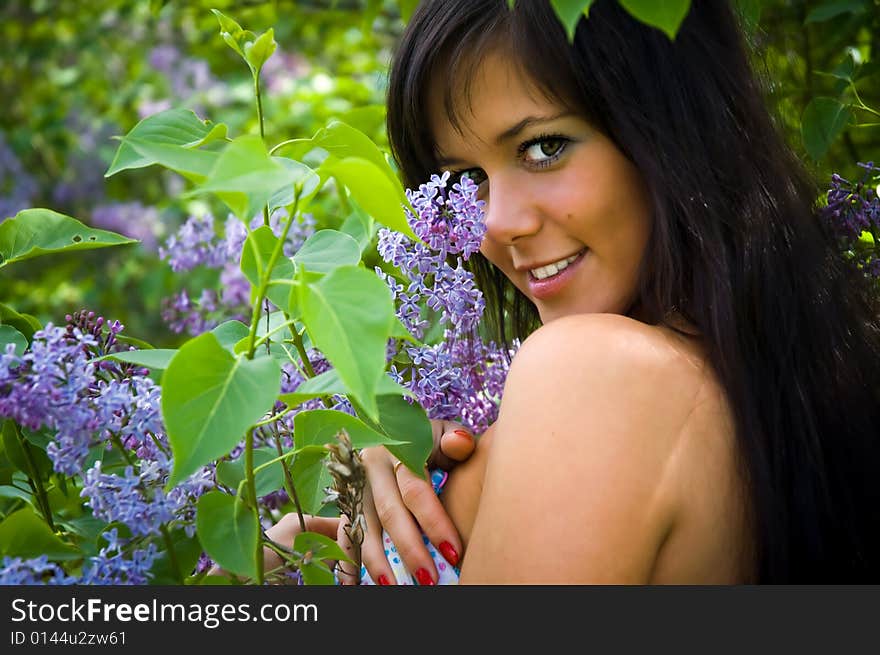 The  Girl And Blossoming Lilac