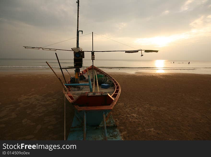 Boat On Sunset Beach