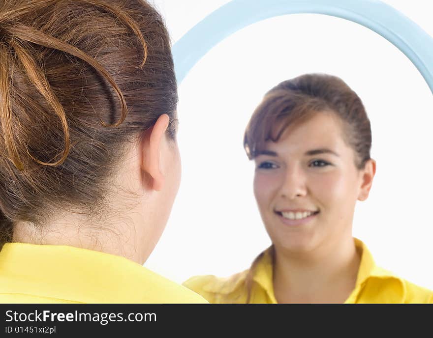 Cute girl portrait in mirror