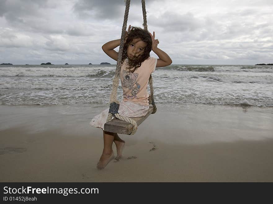 Girl on swing at the sea, on Koh Chang taken