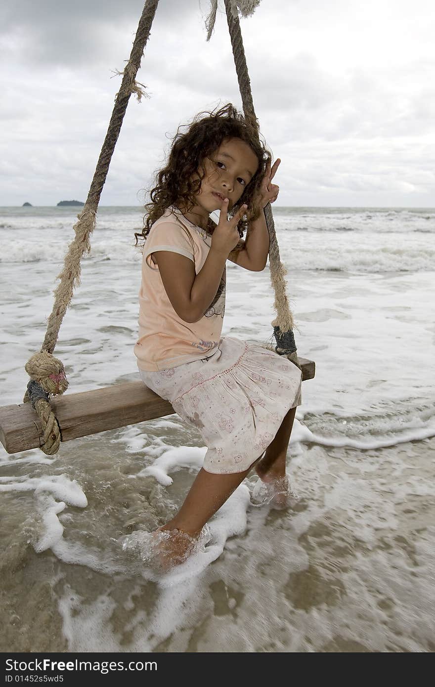 Girl on swing at the sea, on Koh Chang taken