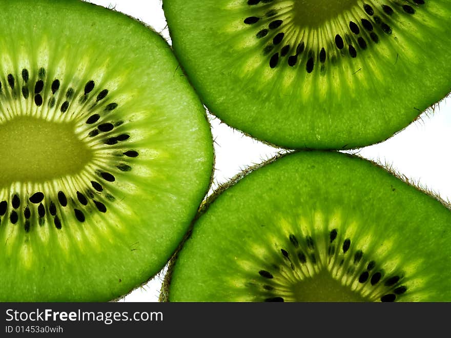 Three slices of kiwi fruit