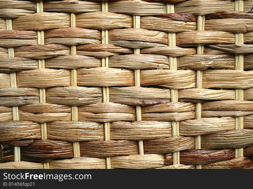 Detail of wickers and canes basket. Natural background. Detail of wickers and canes basket. Natural background.