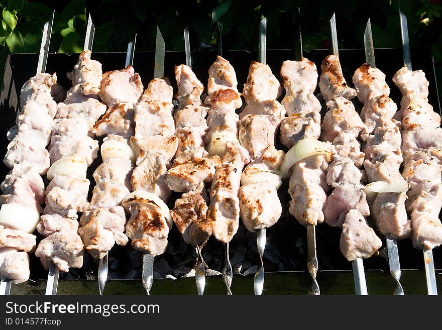 Appetizing shashlik on metal skewers